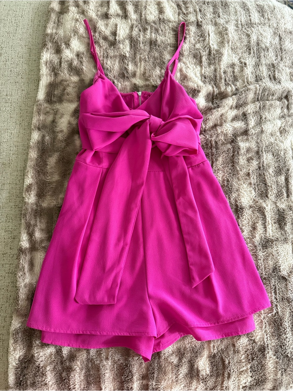 The Impeccable Pig Pink Bow-Front Romper